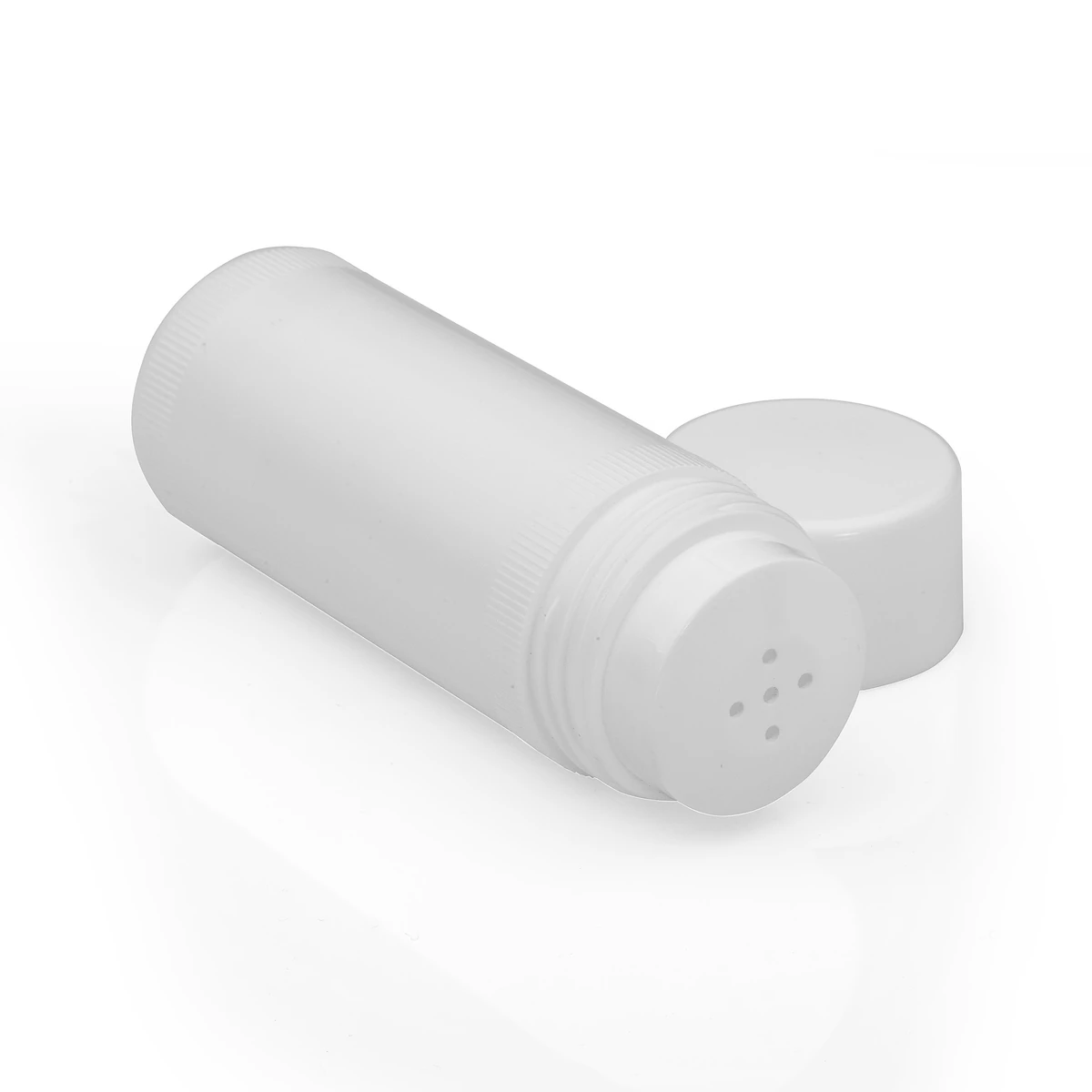 Close-up of the perforated dispensing insert and threaded bottle neck